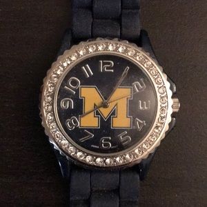 Univ of Michigan watch with crystals on dial.